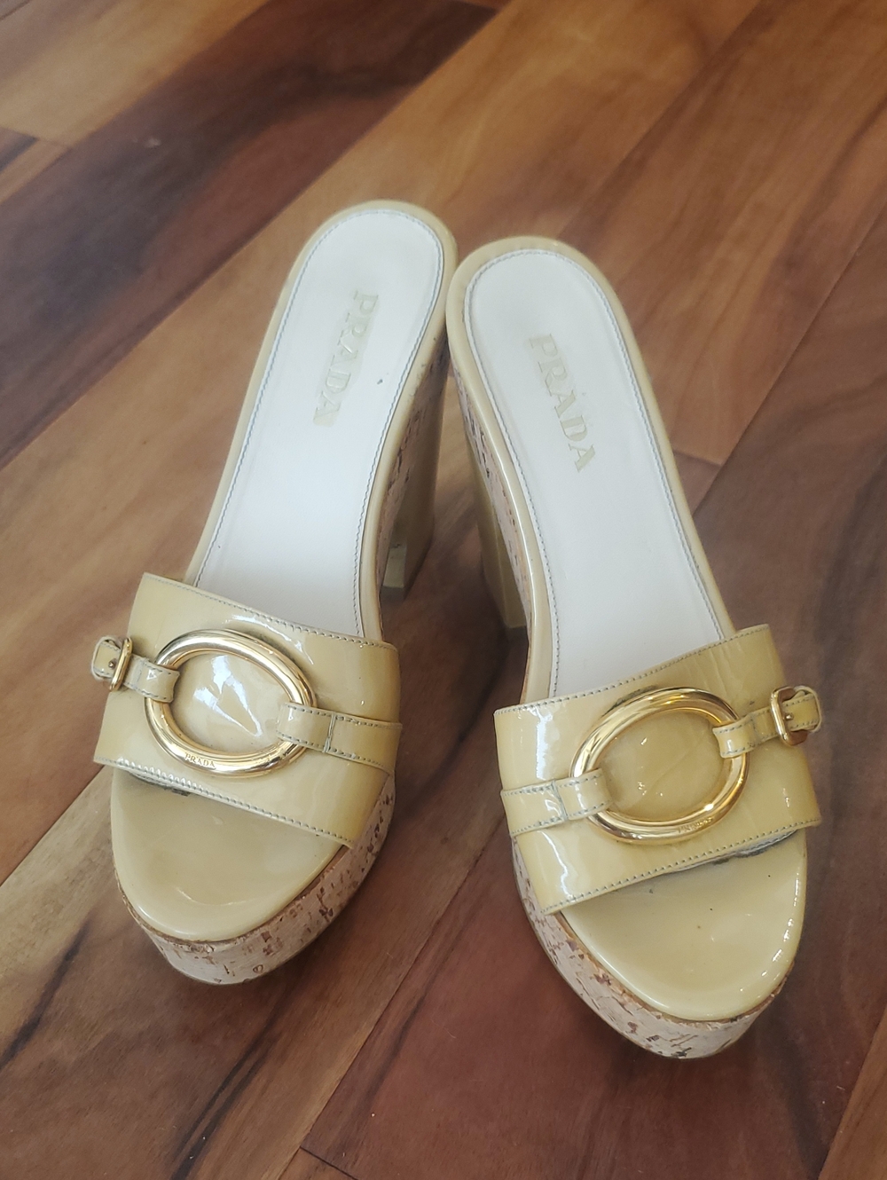 Prada Patent Leather Slide Mules in Pale Yellow with Gold Buckle